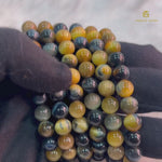 Load and play video in Gallery viewer, Golden Blue Tiger Eye Bracelet
