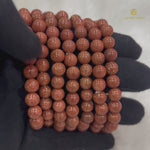 Load and play video in Gallery viewer, Red Sunstone Bracelet
